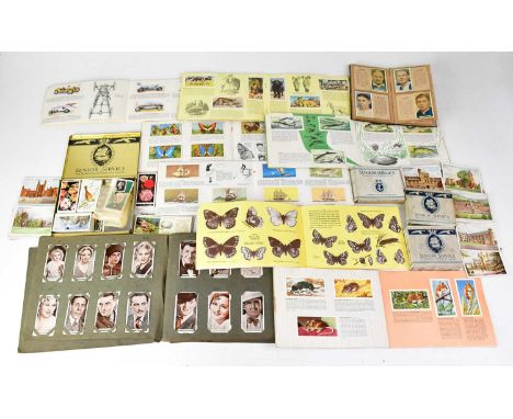 A large quantity of cigarette and tea cards, the majority in albums, to include John Player &amp; Sons, Wills's Senior Servic
