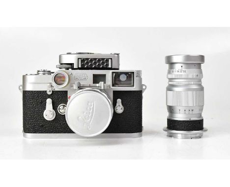 LEICA; a Leitz Wetzler model M3 camera, serial no. 912491 dating to 1957, with Leica Meter MC in brown leather case, accompan