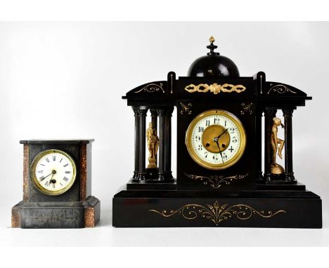A large slate mausoleum mantel clock, the chapter ring set with Roman numerals, flanked by two gold-painted figures, 46 x 49c