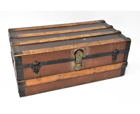 A wooden and metal bound banded trunk with carrying handles, 32 x 79 x 44cm.
