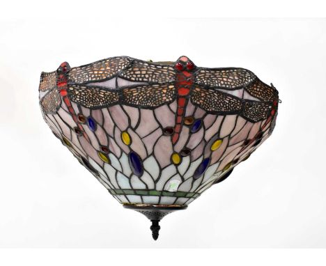 A Tiffany-style leaded glass lampshade, with dragonfly decoration and roundels, on a pink and pale blue ground, height 26cm, 