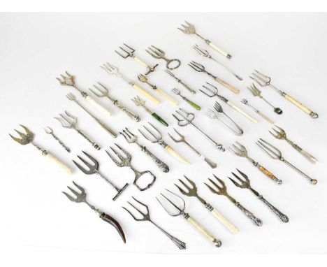 A collection of bread forks, mainly silver-plated, some with bone handles, two with silver handles, together with a hallmarke