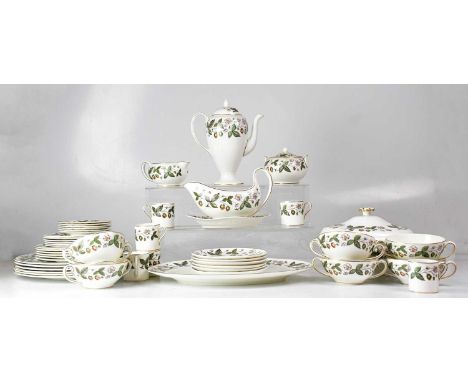WEDGWOOD; a 'Strawberry Hill' part dinner and tea service comprising a coffee pot, cups, a soup bowl, saucers and plates, a m