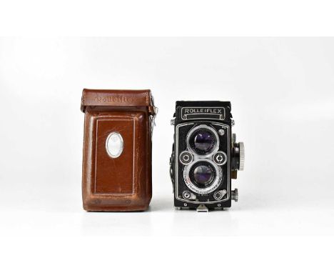 ROLLEIFLEX; a 3.5 E2 Type 1 TLR medium format camera, serial no. E2 1870728, with Carl Zeiss Planar 1:3.5 f=75mm taking lens,