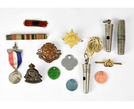 Military badges including Lancashire Hussars, Suffolk Regiment and Irish Guards examples, a Royal Army Ordnance Corps plastic
