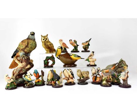 A collection of bird figures, mainly resin examples, the majority by The Country Bird Collection, including an eagle perched 