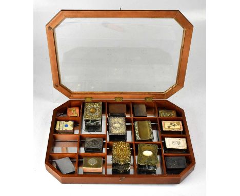 A collection of sixteen various matchbox covers including repoussé brass and silver-plate examples, also filigree white metal