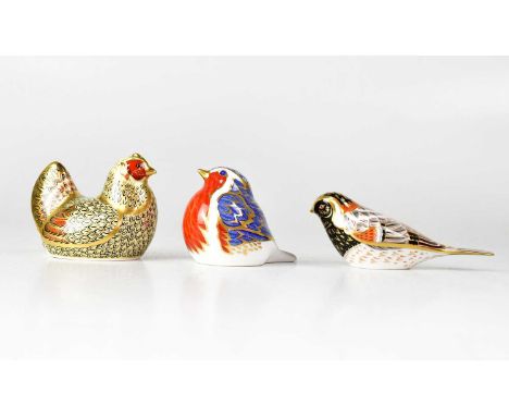 ROYAL CROWN DERBY; three Imari paperweights, 'Bunting' and 'Farmyard Hen', with gold stoppers, and a robin with silver stoppe