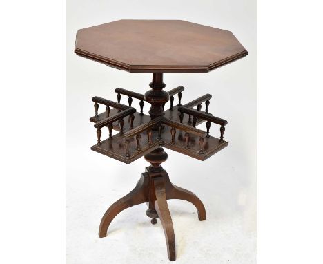An Edwardian mahogany octagonal-topped side table with unusual cross-form undertier with bobbin turned rails, on a quatrefoil