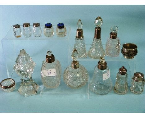 A collection of silver mounted cut glass Scent Bottles, together with a pair of small silver and guilloche enamel mounted cut