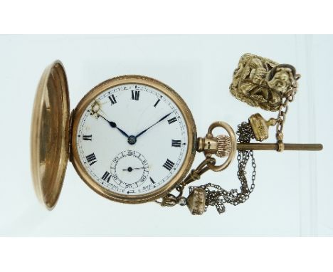 A 9ct gold 'Hunter' Pocket Watch, the case with engine-turned decoration, 1?in (4.75cm) diameter, suspended from a gilt-metal