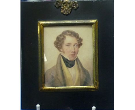 20thC School Portrait miniature of a young girl with short blond hair watercolour, roundel, signed and dated 1927, in gilt me