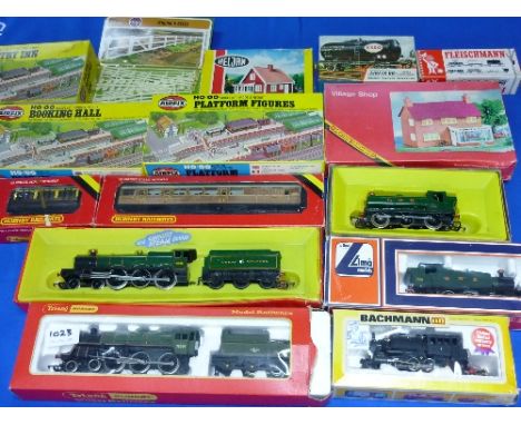 A quantity of "00" gauge model railway, including locomotives by Hornby, Lima and Bachmann, passenger coaches and goods wagon