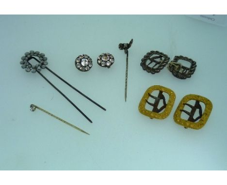 A pair of George III small silver Buckles, hallmarked Birmingham 1816, a pair of gilt metal buckles, a cut steel hair pin wit
