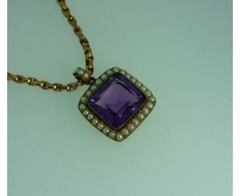 An amethyst and seed pearl Pendant, the facetted central amethyst surrounded by seed pearls, the reverse with hinged box and 