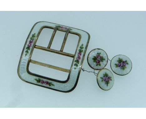 An Edwardian Buckle and matching three Buttons, in silver gilt, the front in white guilloche enamel painted with rose buds, b