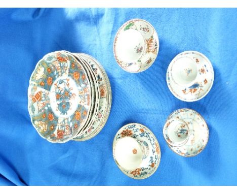 A Chinese famille rose Tea bowl and saucer, decorated with figures and floral sprays, possibly decorated in England, teabowl 