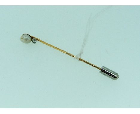 A stickpin, mounted in rose coloured metal, with baroque pearl finial, and small diamnd beneath.