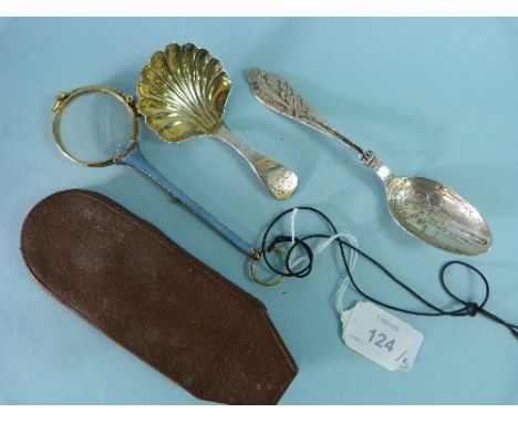 A Russian silver Caddy Spoon, assay marks for Moscow, 1833, the gilded shell shaped bowl with plain handle, crest engraved to