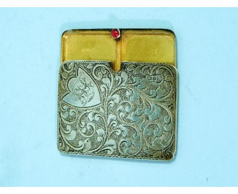 An Edwardian silver sliding Stamp Case, by Ahronsberg Brothers, hallmarked Birmingham, 1904, with ruby coloured glass button 