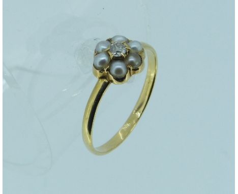 Two Victorian seed Pearl Rings, one set in the front with ten small seed pearls, split shoulders and shank, in gilt metal the