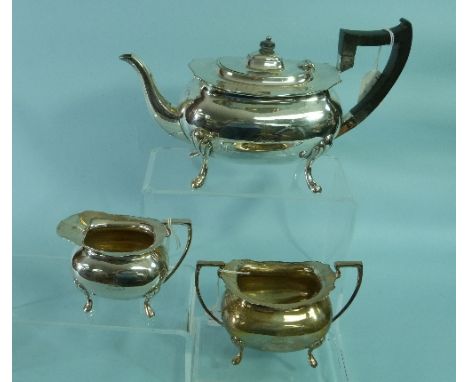 A George V silver three piece Tea Set, by Walker & Hall, hallmarked Sheffield, 1926, of ovoid form, with wavy cut edges, the 