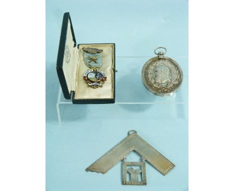 A George V silver Masonic Set Square Jewel, hallmarked London, 1917, 1.7g, together with a large and heavy Masonic jewel pend