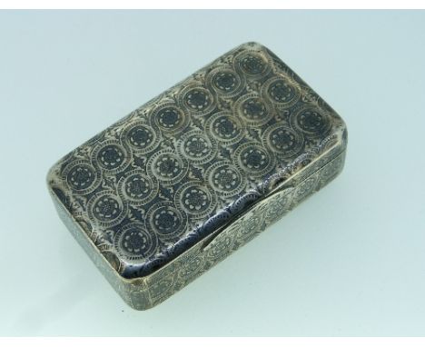A Russian silver and niello work Snuff Box, assay marks for Moscow, 1835, with flush hinged lid, the whole chased with a repe
