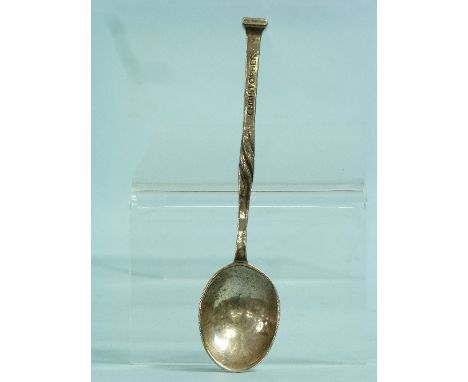 An Arts & Crafts hammered silver Spoon, by Omar Ramsden, hallmarked London, 1927, the stem with central twist detail and nail