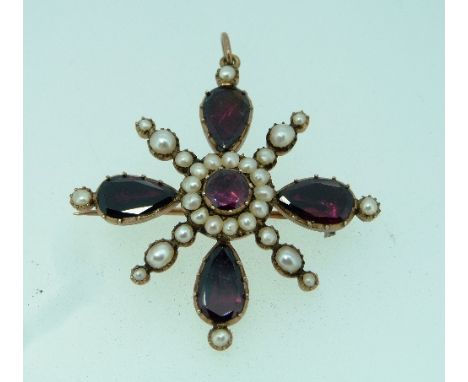 An attractive Georgian Pendant / Brooch, of cross form, set with five foiled and facetted garnets, the centre stone surrounde