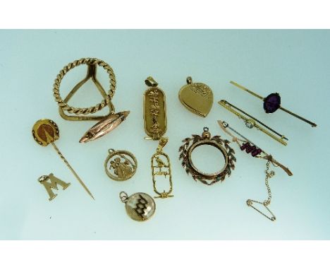 A small collection of Jewellery, including 9ct yellow gold scarf ring, locket, initial pendant frame etc., 28g., a 15ct horse