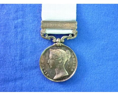 Army of India Medal, with Bhurtpoor clasp, inscribed to: T. Grehan. 59th Foot, with ribbon.