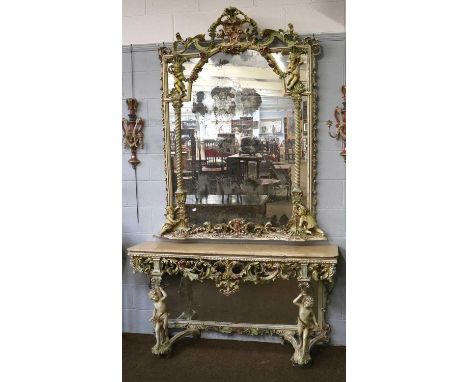 A Reproduction Marble Top Console Table and Mirror, in Italian Rococco style, adorned with putti, flower festoons and twist s