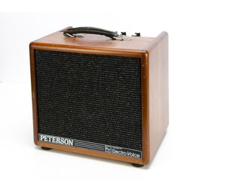 Peterson Guitar Combo Amp, a Peterson Guitar Special 100, amplifier/speaker, powered by Electro-Voice, wood cased, with some 
