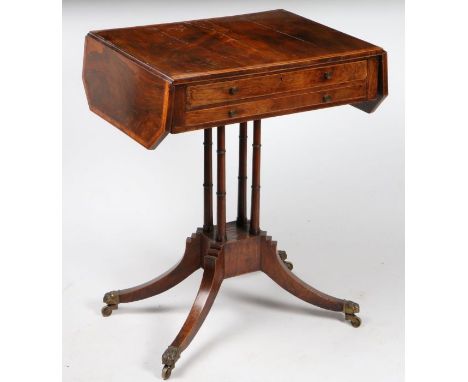 A good small George III Sheraton rosewood sofa table, the cross-banded top with drop leaves above two drawers with compartmen