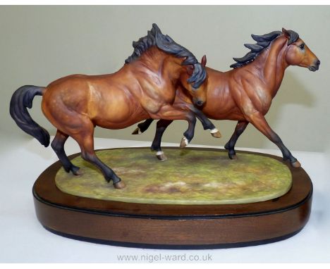 A Royal Worcester figure entitled 'Galloping Ponies', by Doris Lindner, limited edition No. 42 /  500 with certificate, 13'' 