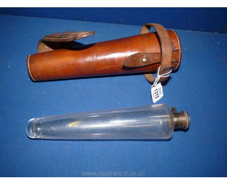 A leather Colonial Saddle Case with a vintage glass flask with silver top, Birmingham 1932, flask 9 3/4'' , with case 10''.