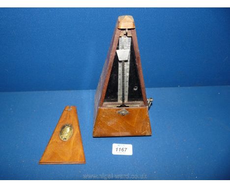 A metronome, 9'' tall.