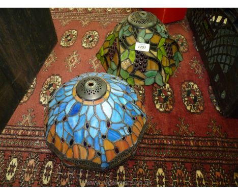 Two Tiffany style lamp Shades, one with dragonfly pattern in blue and orange, 10" diameter, the other with grape pattern in g