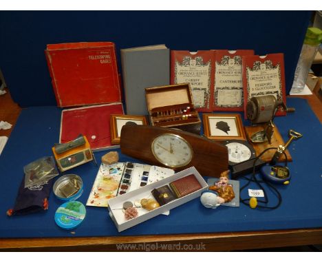 A quantity of miscellanea including Smiths mantle clock, vintage crayon box, paint pallet, office pencil sharpener, Ordinance