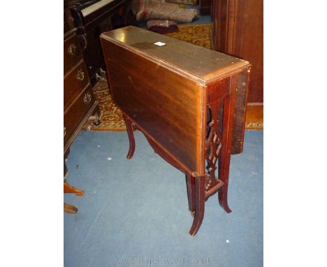 An early 20th c. Mahogany Sutherland Table having light and darkwood strung and cross-banded perimeter, 26 3/4'' x 5 7/8'' ex