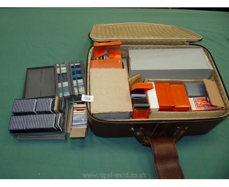 A case of 35 mm vintage Slides including scenes of buildings, people, etc.