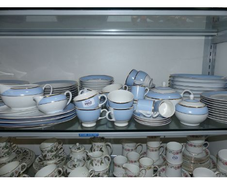 A good quantity of modern Doulton dinner, tea and coffee ware in blue and white with gold rims and bands including ten each d