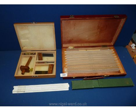 A box of Am-Tech model makers tools and a fitted wooden box of surveyor's Scales/Rulers and a cased Faber Crystal slide rule