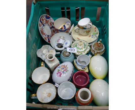 A quantity of small china items including Royal Worcester cup and saucer, ceramic eggs, coffee cans etc.