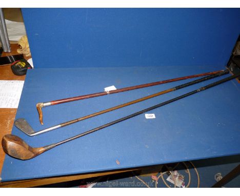 Two golf sticks marked Kilmacolm, and Timperly golf clubs and a horn handled walking stick.