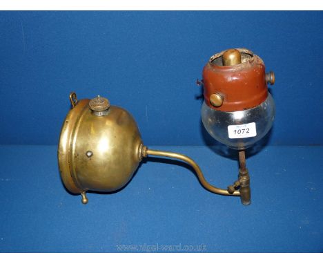 A brass wall hanging pressurised Oil Lamp possibly tilly.