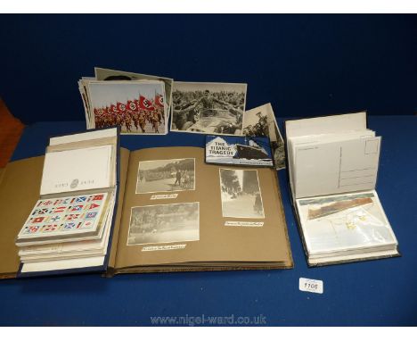 Two albums of reproduction Titanic postcards, Nazi propaganda items and  an album of black and white prints of Paris.