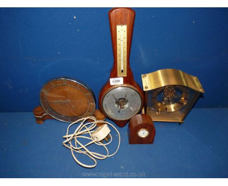 Three clocks including Kundo electronic mantle, small Tempest quartz, old Smiths and a modern Weathermaster barometer.