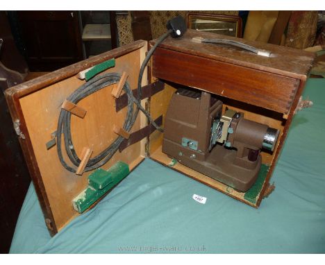 A wooden cased Kershaw model 250 strip projector.